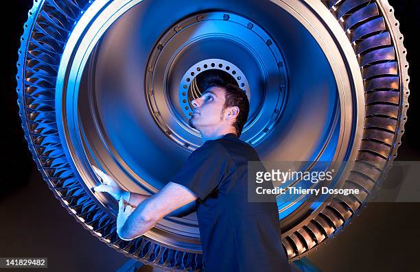 aerospace technician working in factory - rymdindustri bildbanksfoton och bilder