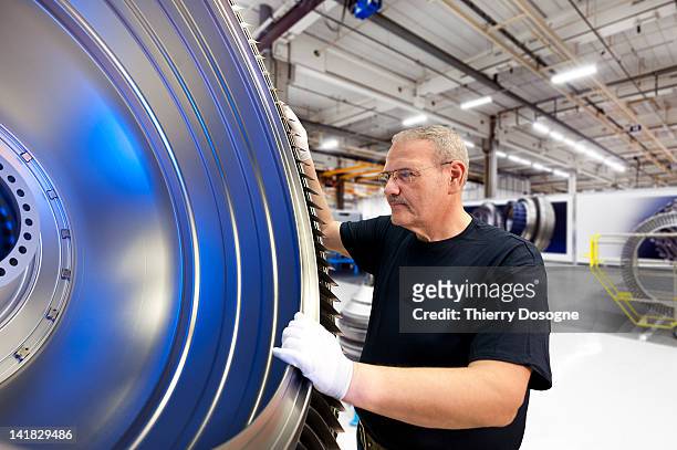 aerospace technician working in factory - aircraft assembly plant fotografías e imágenes de stock