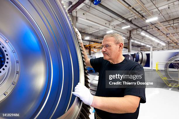 aerospace technician working in factory - kompressor bildbanksfoton och bilder