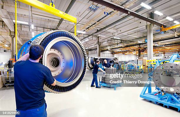 aerospace technicians working on aircraft engine - industrial machinery stock-fotos und bilder