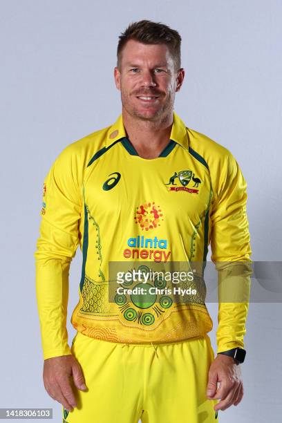 David Warner poses during an Australian One Day International squad headshots session at Oaks Townsville Metropole Hotel on August 26, 2022 in...