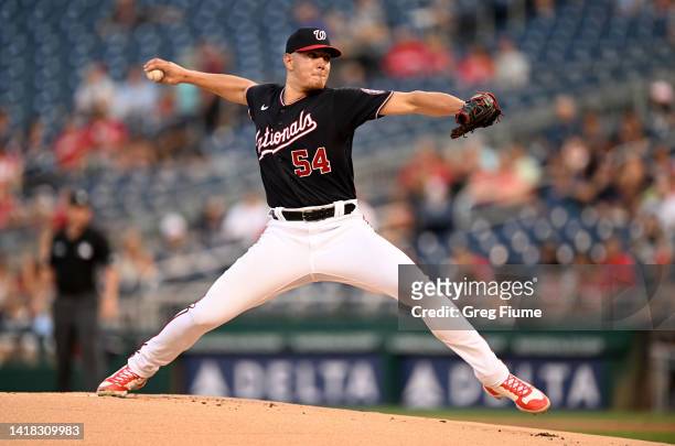 Cade Cavalli of the Washington Nationals pitches in the first inning of his major league debut against the Cincinnati Reds at Nationals Park on...