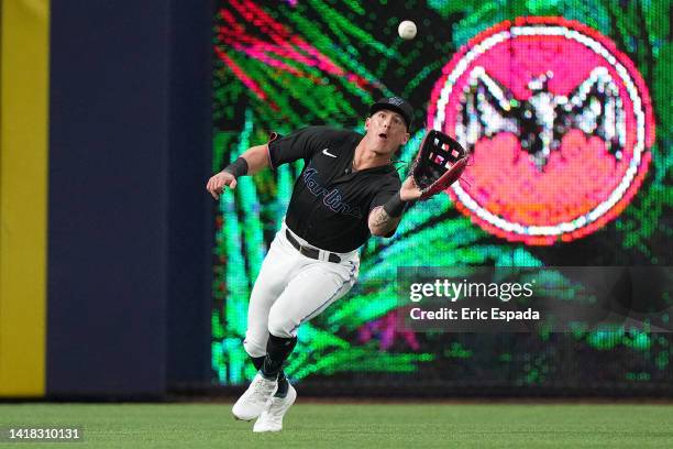 Peyton Burdick of the Miami Marlins catches a fly ball during the fourth inning against the Los Angeles Dodgers at loanDepot park on August 26, 2022...