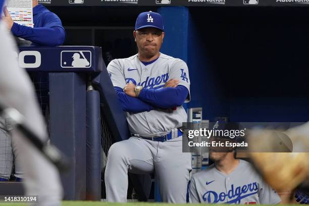 Manager Dave Roberts of the Los Angeles Dodgers looks on during the game against the Miami Marlins at loanDepot park on August 26, 2022 in Miami,...