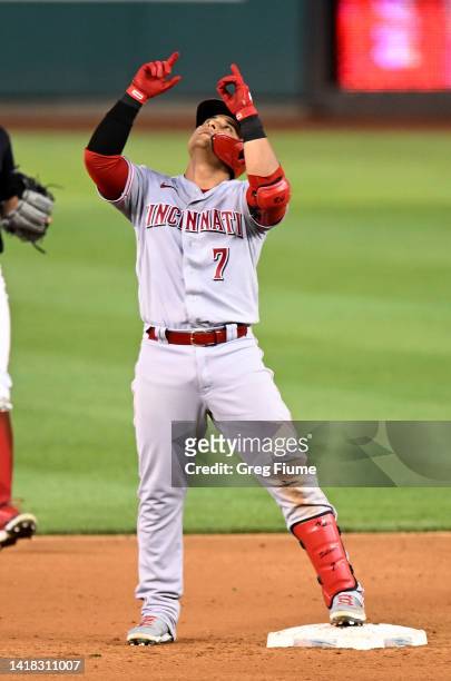 Donovan Solano of the Cincinnati Reds celebrates after driving in two runs with a double in the third inning against the Washington Nationals at...