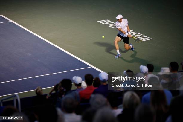 Botic van de Zandschulp of Netherlands returns a shot from Adrian Mannarino of France during their semi-finals match on day seven of the...