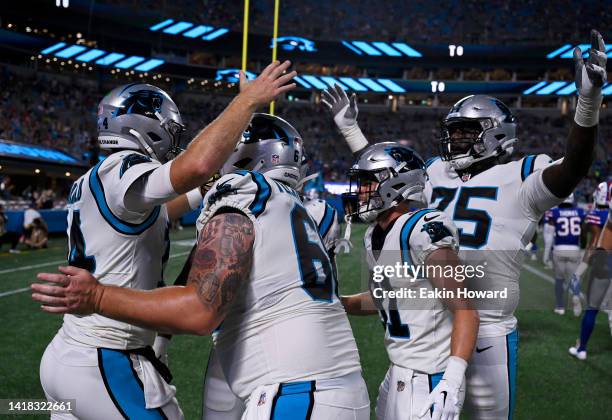 Sam Darnold of the Carolina Panthers and teammates celebrate Darnold's touchdown against the Buffalo Bills during a preseason game at Bank of America...