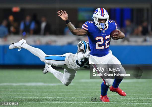 Kalon Barnes of the Carolina Panthers dives to tackle Duke Johnson of the Buffalo Bills during the third quarter of a preseason game at Bank of...