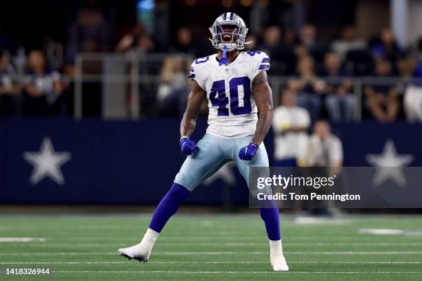 Safety Juanyeh Thomas of the Dallas Cowboys celebrates after breaking up a pass intended for wide receiver Cade Johnson of the Seattle Seahawks in...