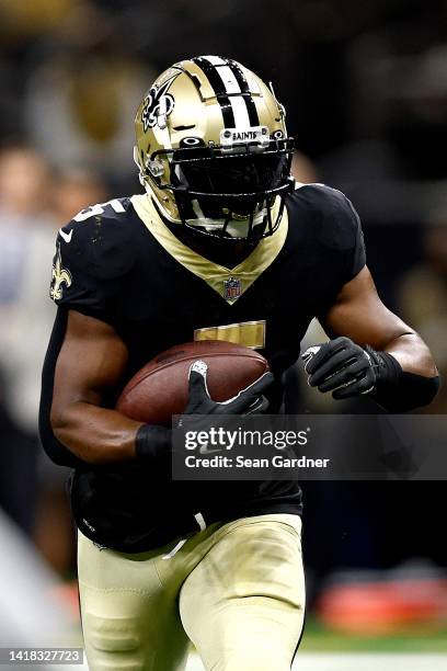 Mark Ingram II of the New Orleans Saints runs with the ball during the first quarter against the Los Angeles Chargers an NFL preseason game at...
