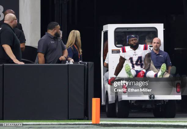 Wide receiver Ty Montgomery of the New England Patriots is taken off the field on a cart after he was injured on a play against the Las Vegas Raiders...