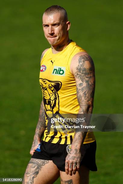 Dustin Martin of the Tigers looks on during a Richmond Tigers AFL training session at Punt Road Oval on August 27, 2022 in Melbourne, Australia.