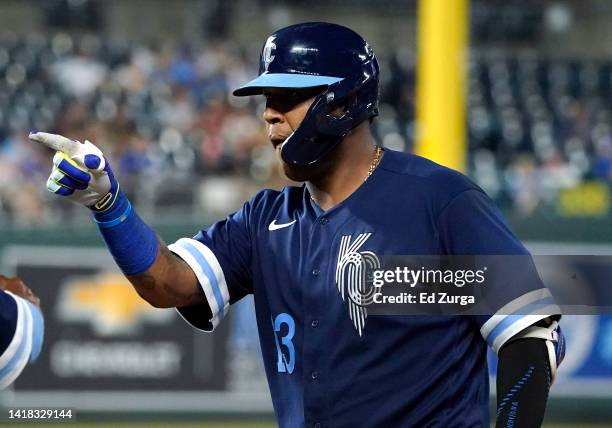 Salvador Perez of the Kansas City Royals celebrates an RBI single in the fourth inning against the San Diego Padres at Kauffman Stadium on August 26,...