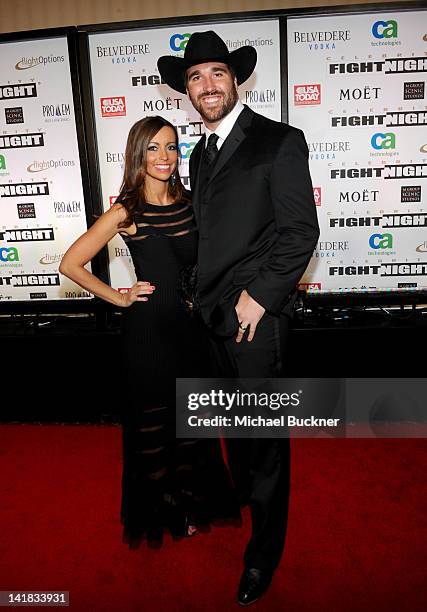 Minnesota Vikings player Jared Allen and wife Amy Johnson arrive at Muhammad Ali's Celebrity Fight Night XVIII held at JW Marriott Desert Ridge...