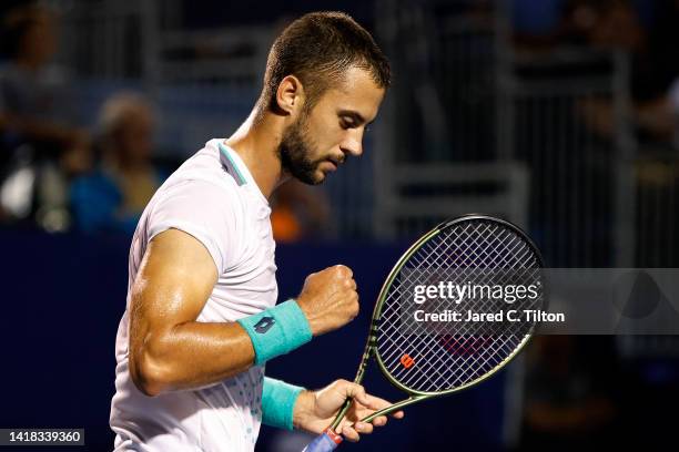 Laslo Djere of Serbia reacts following a point against Marc-Andrea Huesler of Switzerland during their semi-finals match on day seven of the...