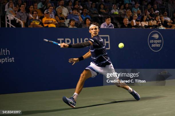 Marc-Andrea Huesler of Switzerland returns a shot from Laslo Djere of Serbia during their semi-finals match on day seven of the Winston-Salem Open at...