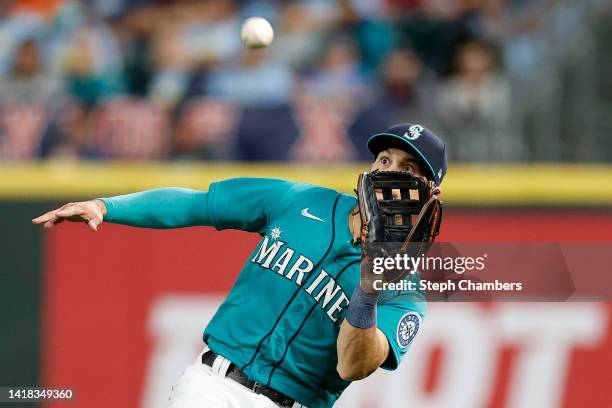 Sam Haggerty of the Seattle Mariners catches a fly ball during the seventh inning against the Cleveland Guardians at T-Mobile Park on August 26, 2022...