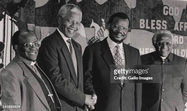 Bishop Stanley Mogoba, Nelson Mandela, Gatsha Buthelezi, and Desmond Tutu . .