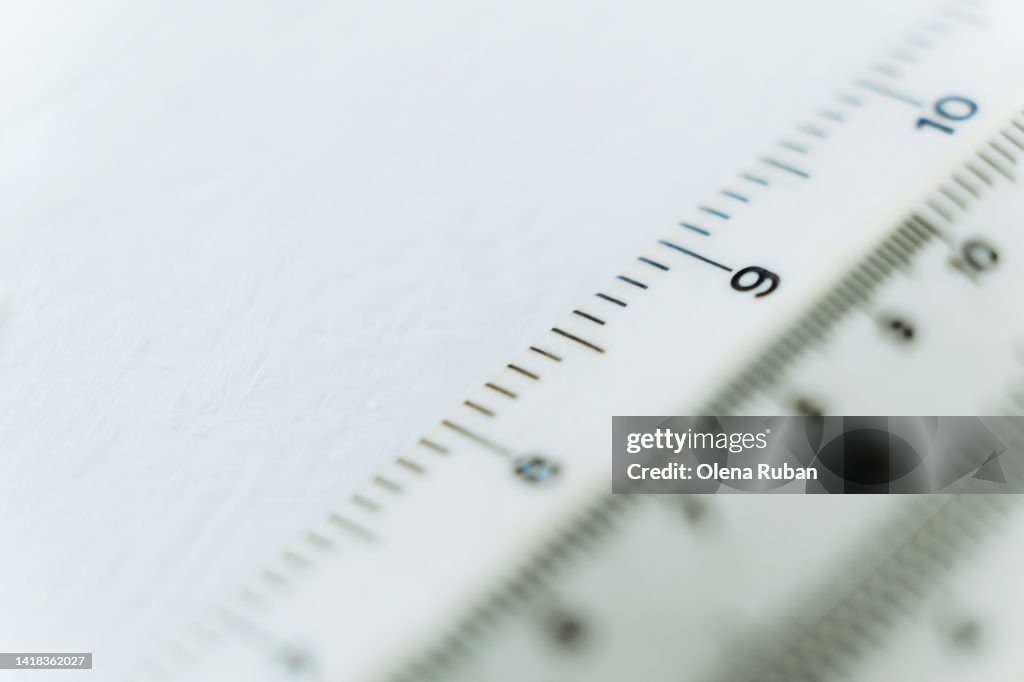Straight ruler with cm and inches.