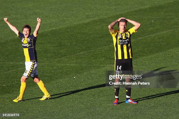 Michael McGlinchey of the Marriners celebrates at the final whistle as Mirjan Pavlovic of the Phoenix looks dejected during the round 25 A-League...