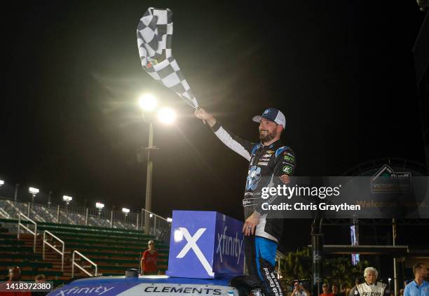 Jeremy Clements, driver of the One Stop/ASE Chevrolet, celebrates in the Ruoff Mortgage victory lane after winning the NASCAR Xfinity Series Wawa 250...