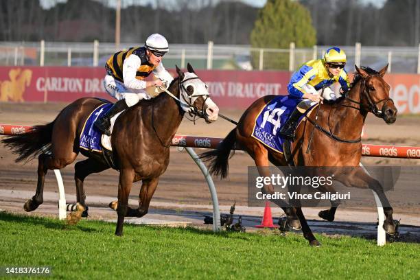 Ethan Brown riding Snapdancer defeats Mark Zahra riding I'm Thunderstruck in Race 8, the Magic Millions Memsie Stakes, during Melbourne Racing at...