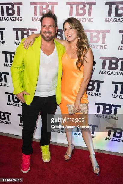 Evan Golden and Amanda Cerny attend TBT Magazine Social Media Edition Powered By Berman Law at Sway Nightclub on August 26, 2022 in Fort Lauderdale,...