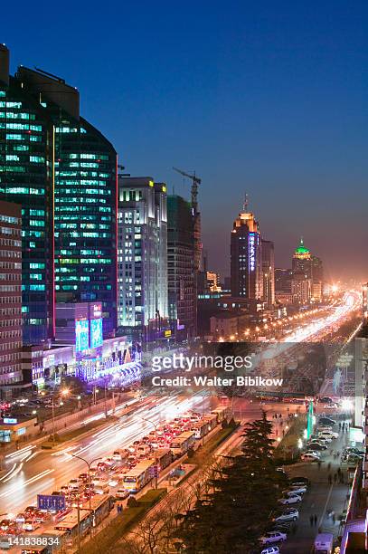 view of jianguomenwai dajie and office buildings looking west, chaoyang district, beijing - jianguomenwai stock pictures, royalty-free photos & images