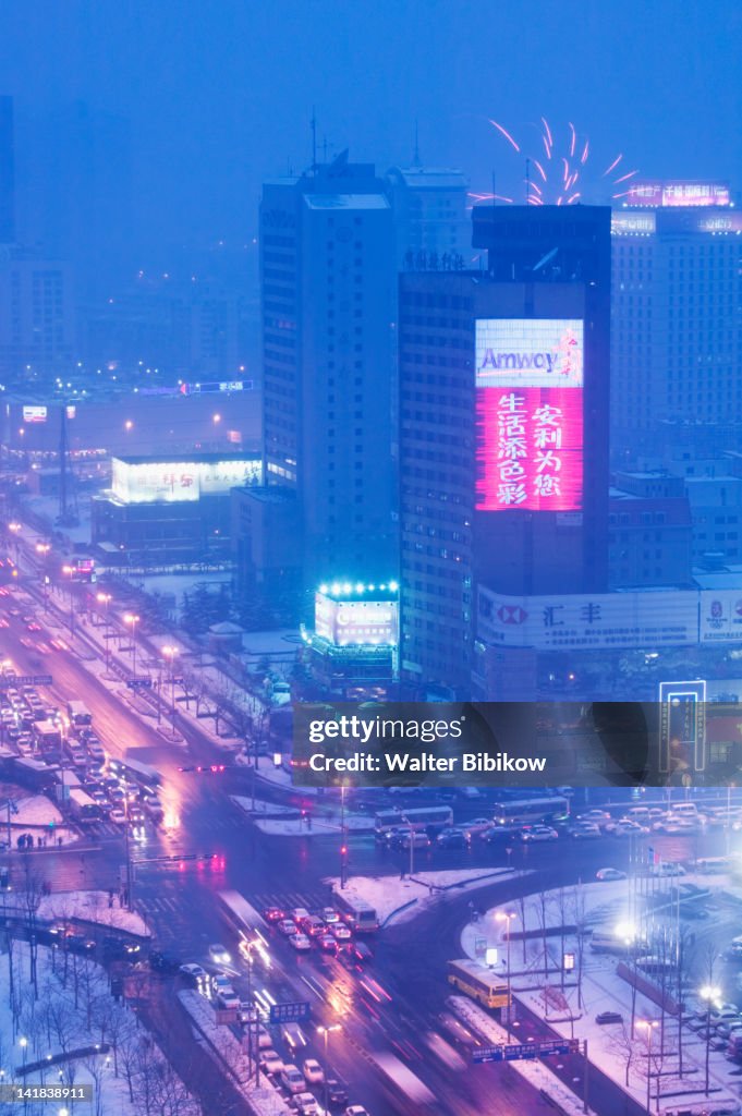 Aerial view of rush hour traffic on Xianggang Zhonglu with snow, China