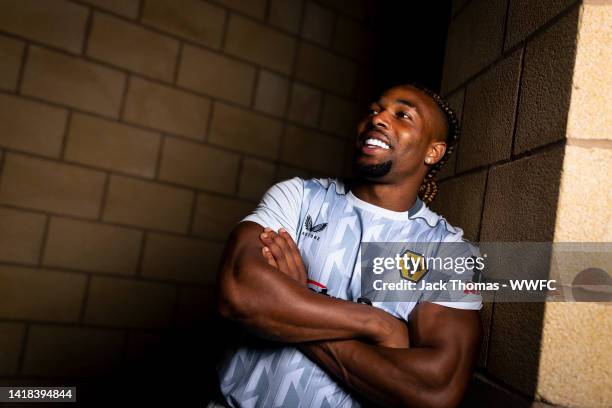 Adama Traore of Wolverhampton Wanderers poses for a portrait in the 2022/23 Third Kit during the Wolverhampton Wanderers Media Access Day at Molineux...