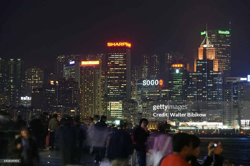 China, Kowloon, visitors to Avenue of the Stars on the Kowloon waterfront, evening