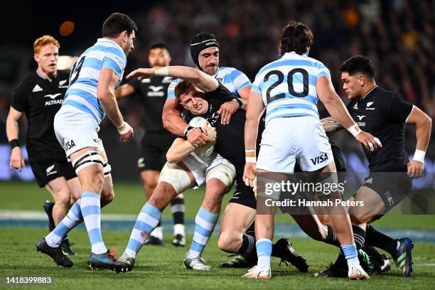 Jordie Barrett of the All Blacks is tackled during The Rugby Championship match between the New Zealand All Blacks and Argentina Pumas at...