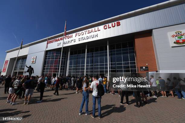 Fans arrive outside the stadium prior to the Premier League match between Southampton FC and Manchester United at Friends Provident St. Mary's...