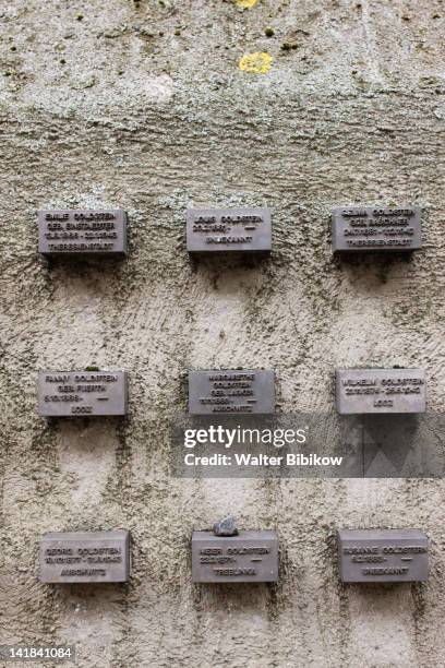 germany, hessen, frankfurt-am-main, frankfurt jewish cemetery, wall with names of holocaust victims - holocaust victims stock pictures, royalty-free photos & images