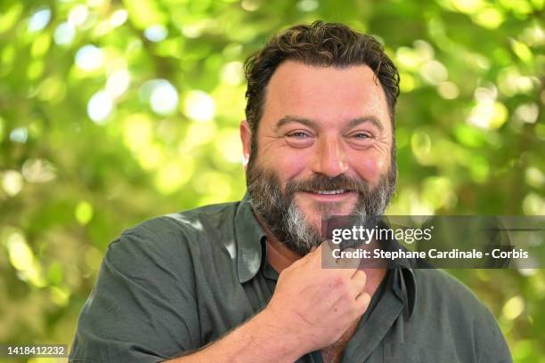 Denis Menochet attends the 'Les Survivants' photocall during the 15th Angouleme French-Speaking Film Festival - Day Five on August 27, 2022 in...