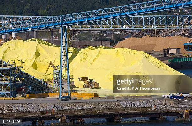piles of sulphur, vancouver, british columbia, canada - sulphur stock pictures, royalty-free photos & images