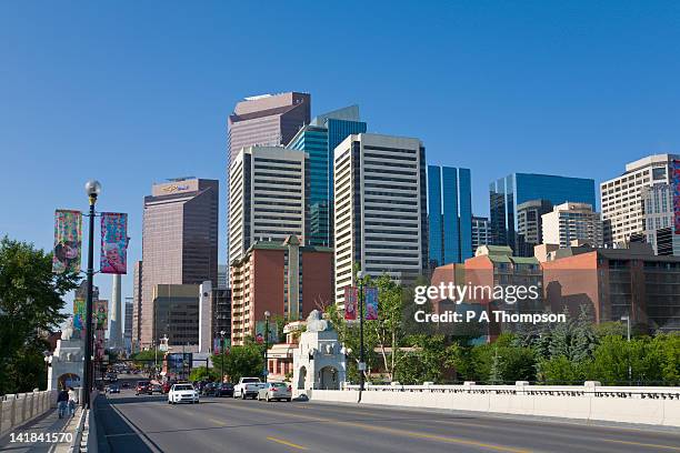 centre st bridge and downtown calgary, alberta, canada - calgary summer stock pictures, royalty-free photos & images