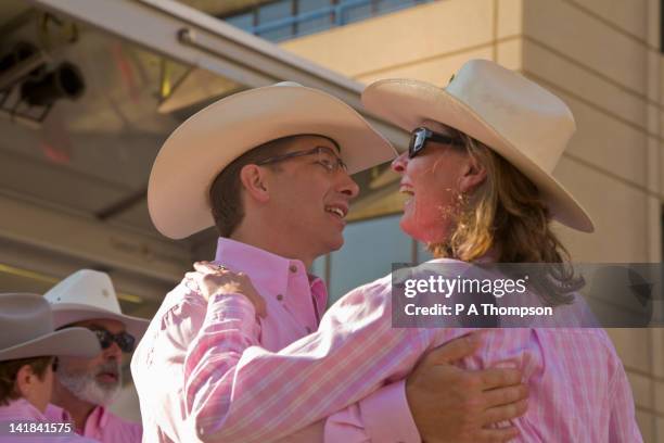 couple dancing, calgary stampede, alberta, canada - calgary stampede stock pictures, royalty-free photos & images