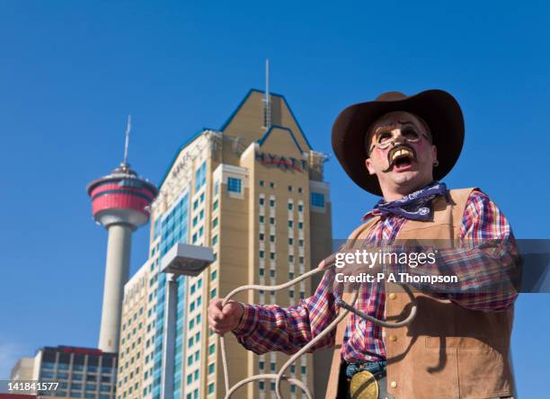 street performer, calgary stampede, alberta, canada - calgary stampede stock pictures, royalty-free photos & images