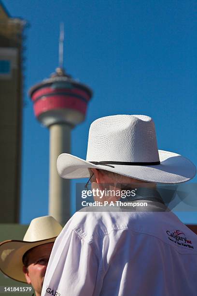 two men wearing stetsons, calgary stampede, alberta, canada - calgary stampede stock pictures, royalty-free photos & images