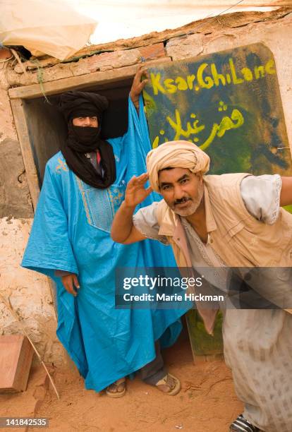 boulanger, arab bread maker with horseback guide to the desert, omar, in ksar ghilane oasis - ghilane stock pictures, royalty-free photos & images