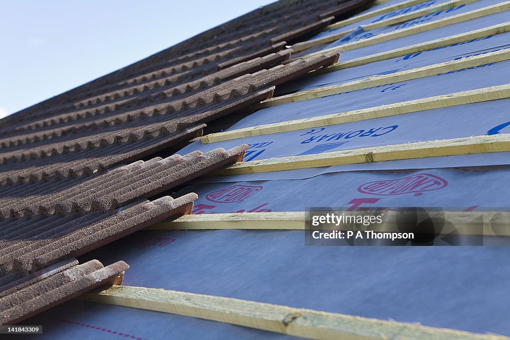 New tiled roof being built PR