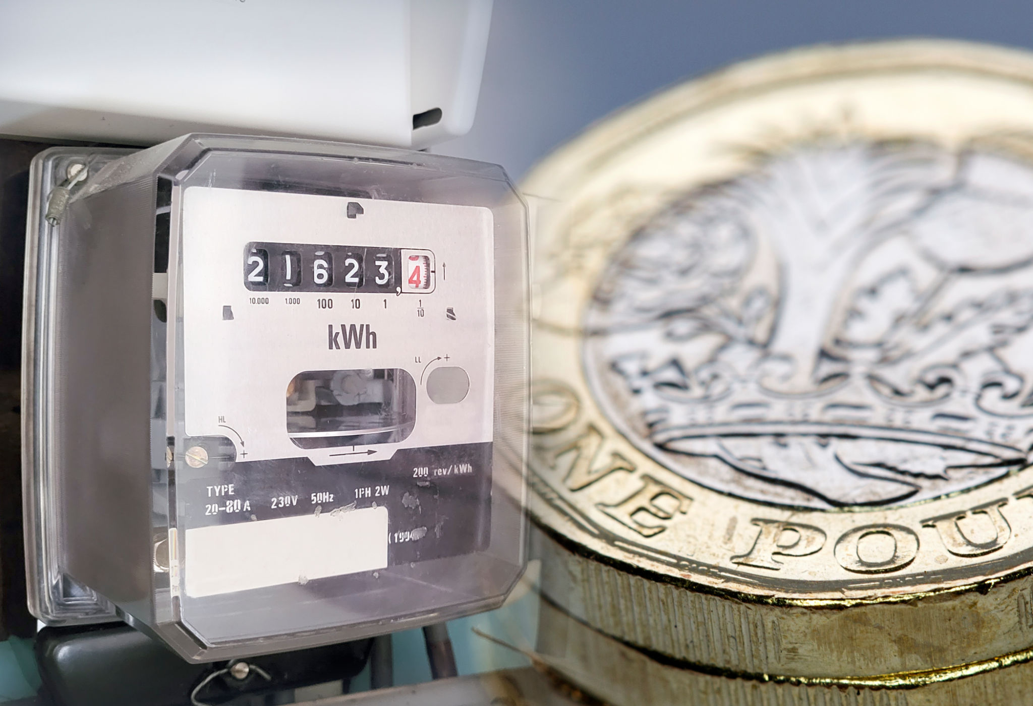 Electric power meter with British currency. Electric power meter with British currency.