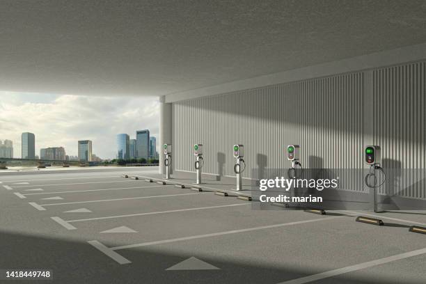 parking space with electric vehicle charging equipment - electronic vapor stock pictures, royalty-free photos & images