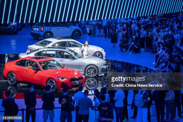 People visit the BMW stand during Chengdu Motor Show 2022 at Western China International Expo City on August 26, 2022 in Chengdu, Sichuan Province of...