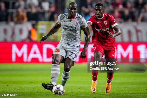 Stefano Okaka of Istanbul Basaksehir is challenged by William Pacho of Royal Antwerp FC during the UEFA Conference League Play-Off Second Leg match...