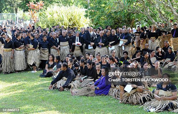 Hundreds of Tongans dressed in black and wearing the traditional ta'ovala waistmats gather to pay their respects to Queen Halaevala Mata'aho, the...