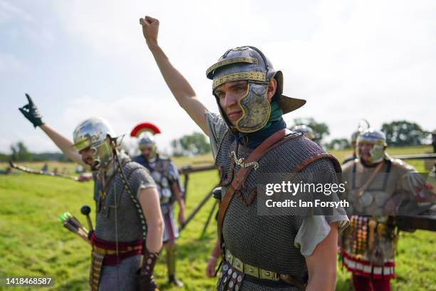 Roman re-enactors give a demonstration of Roman weaponry at Birdoswald Roman Fort on August 27, 2022 in Hexham, United Kingdom. 2022 is the 1900...