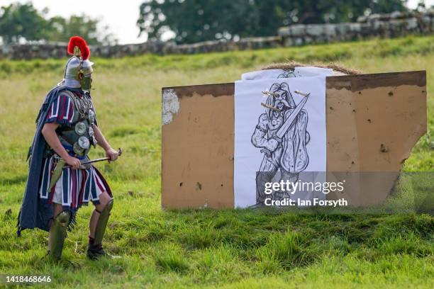 Roman re-enactors give a demonstration of Roman weaponry at Birdoswald Roman Fort on August 27, 2022 in Hexham, United Kingdom. 2022 is the 1900...