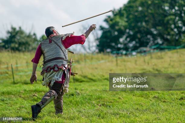 Roman re-enactors give a demonstration of Roman weaponry at Birdoswald Roman Fort on August 27, 2022 in Hexham, United Kingdom. 2022 is the 1900...